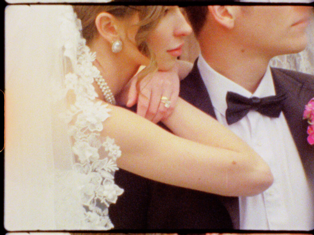 Bride rests on the grooms shoulders at The Little Daisy in Arizona, taken on Super 8.